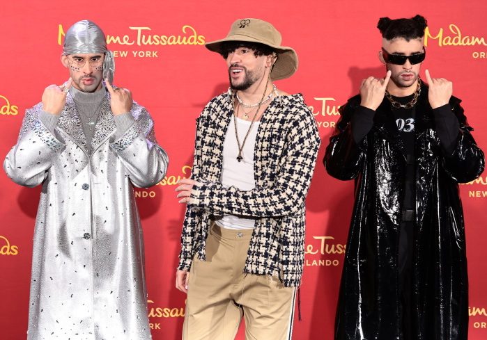 NEW YORK, NEW YORK - APRIL 19: Bad Bunny (C) reveals wax figures for Madame Tussauds New York and Madame Tussauds Orlando at Madame Tussauds on April 19, 2022 in New York City. (Photo by Jamie McCarthy/Getty Images for Madame Tussauds New York)